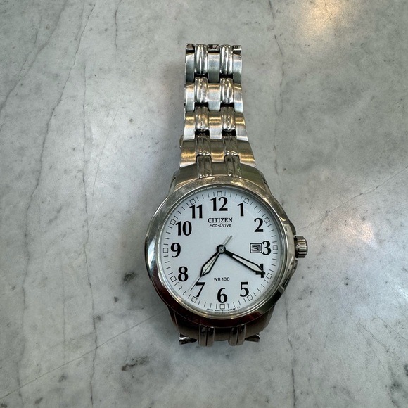 Citizen eco drive wr 100 white face with date. New no box. - Picture 1 of 5